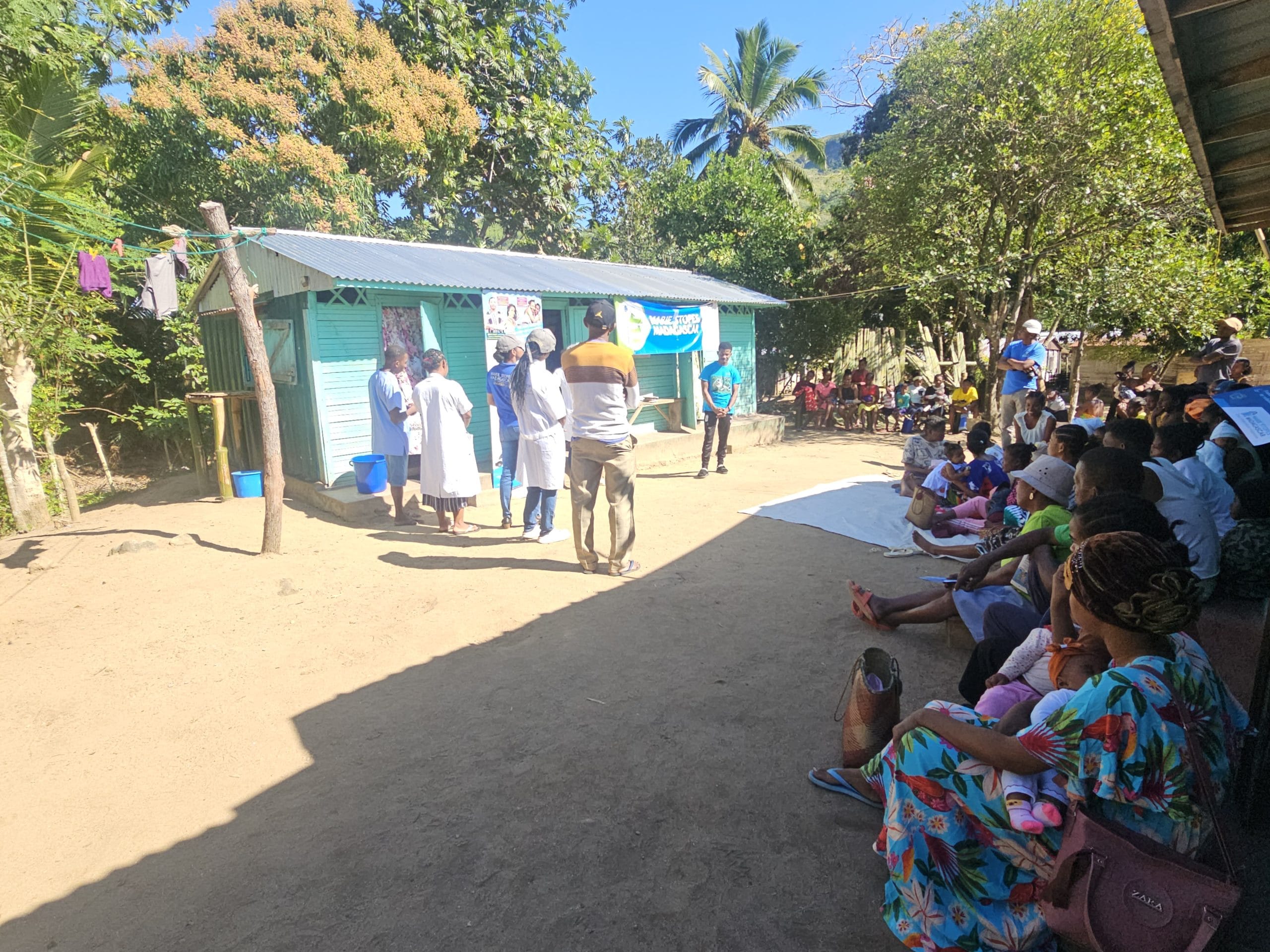 a community group in Madagascar watching a presentation